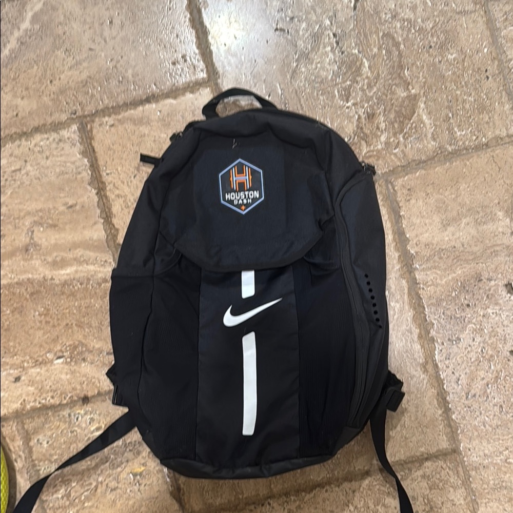 Nike Black and White Backpack with Iconic Swoosh Design